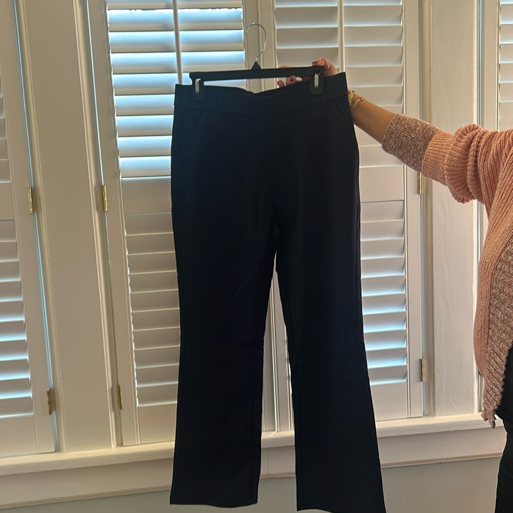 New without tags. Navy work/dress cotton nylon blend pants with spandex